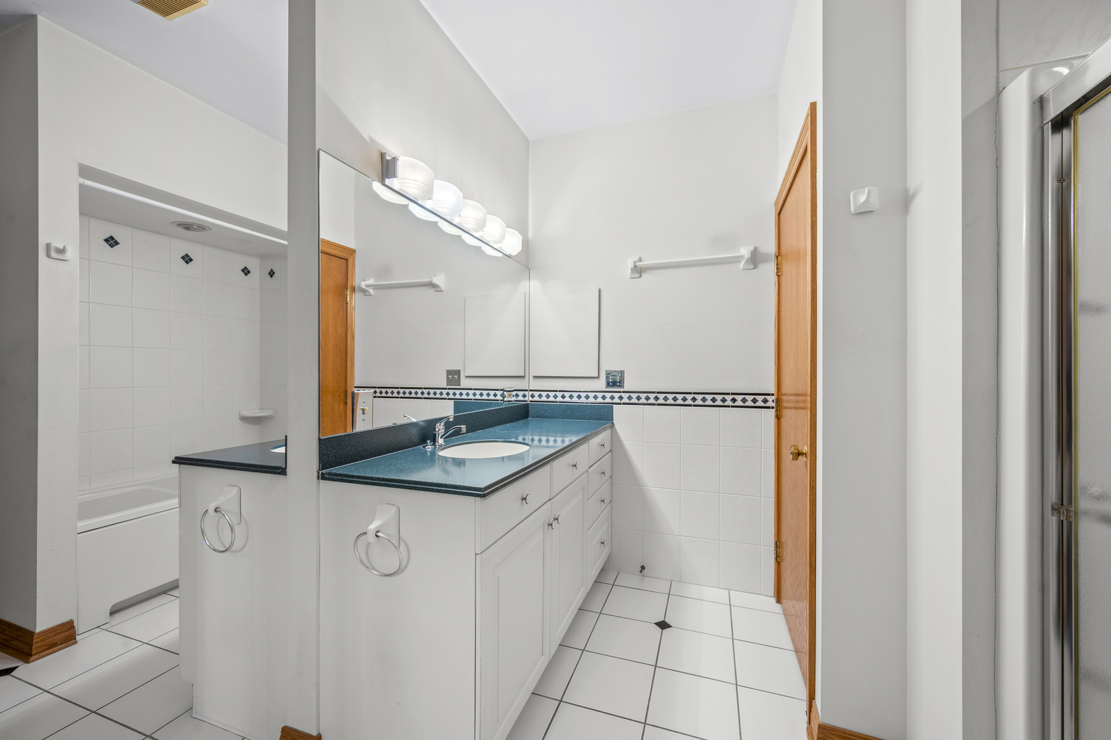 32981 North River Road Libertyville, IL 60048 - Photo 27 of 44 a kitchen with a sink and a refrigerator