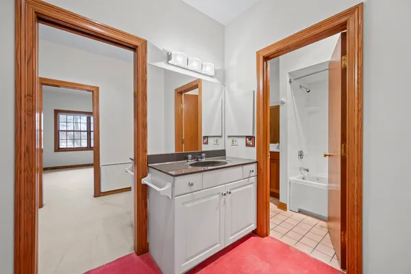a view of a kitchen with a large window
