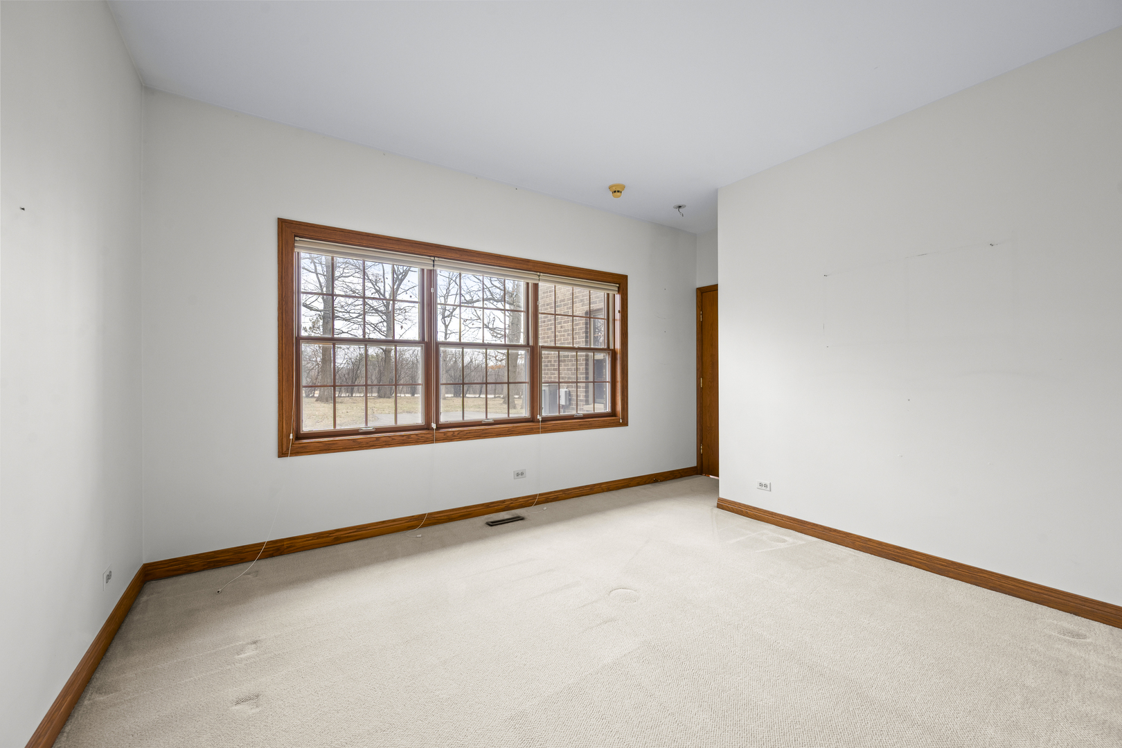 32981 North River Road Libertyville, IL 60048 - Photo 31 of 44 a view of an empty room with a window