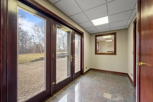 a big room with closet and windows