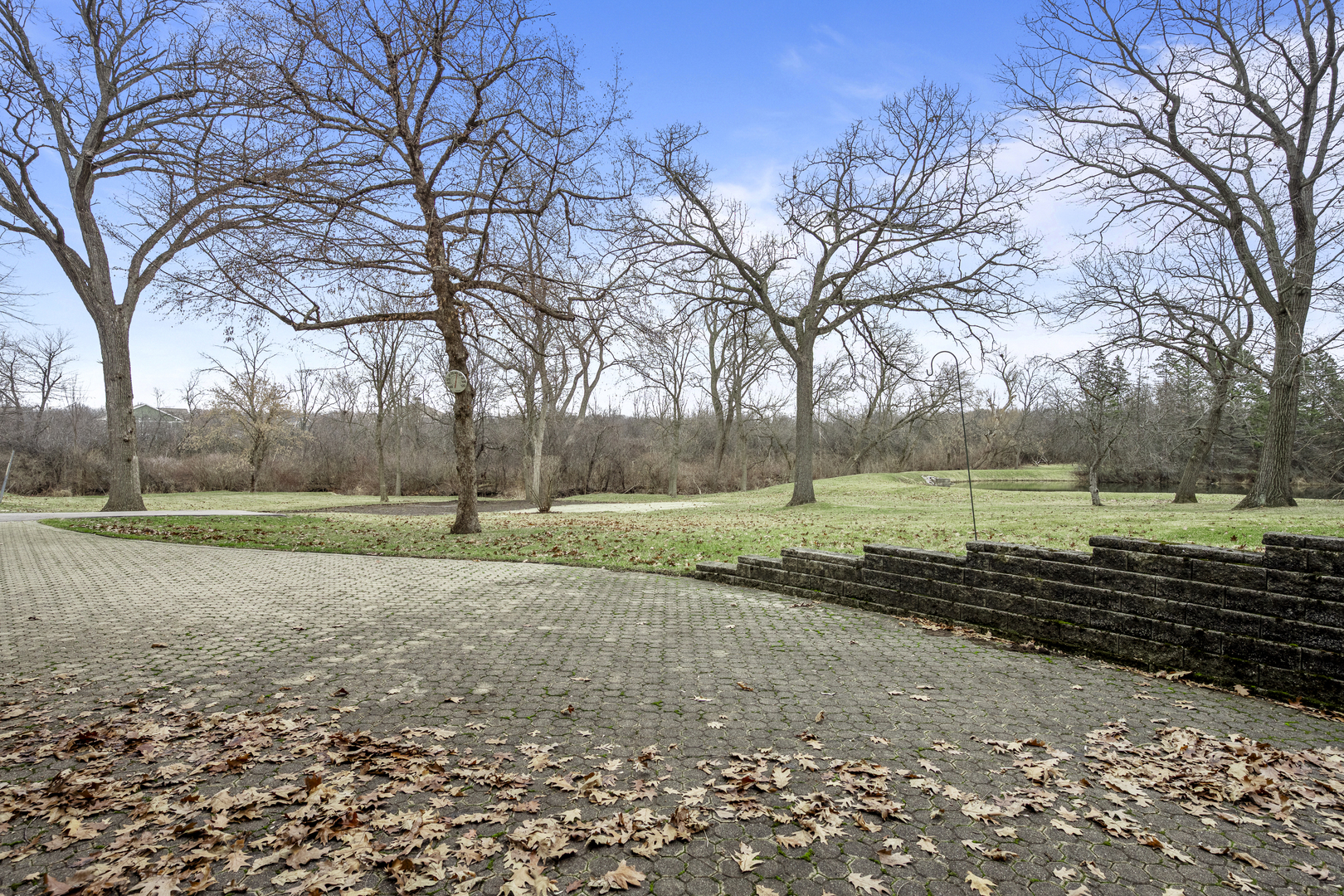 32981 North River Road Libertyville, IL 60048 - Photo 4 of 44 a view of a park that has large trees