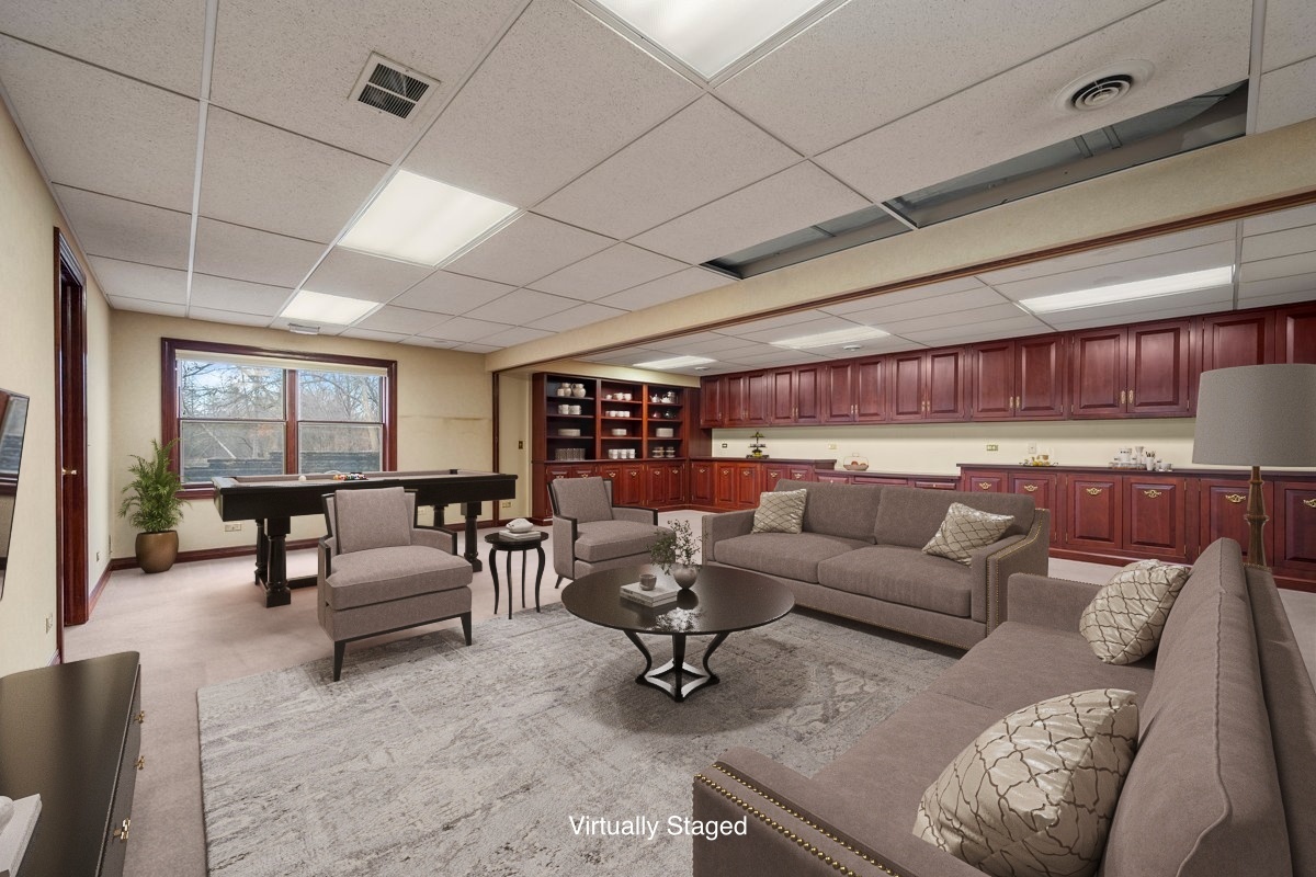 32981 North River Road Libertyville, IL 60048 - Photo 41 of 44 a living room with furniture and a large window