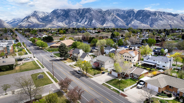 1822 East 9800th Street South Sandy, UT 84092 - Photo 5 of 38 Aerial view of residential area with mountains