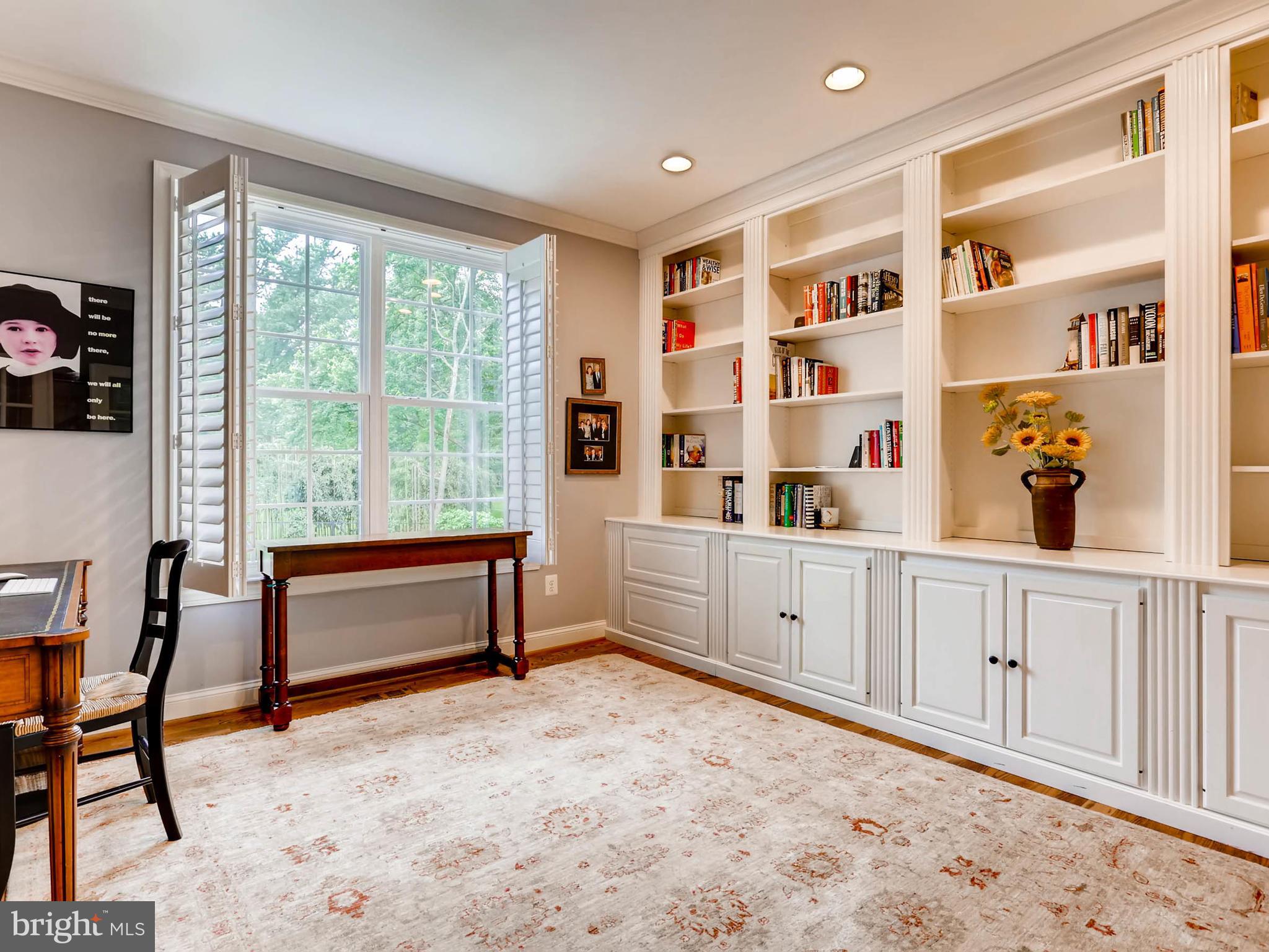 Study with built-ins off main level family room