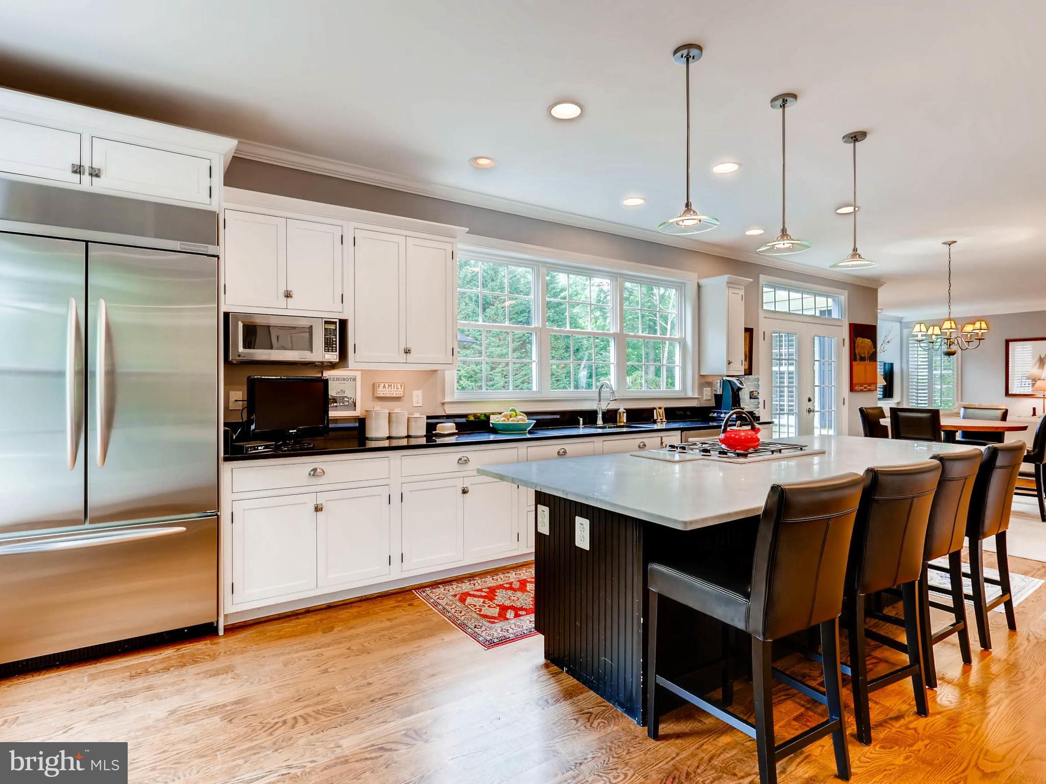 Gourmet kitchen w/ granite counters, marble island