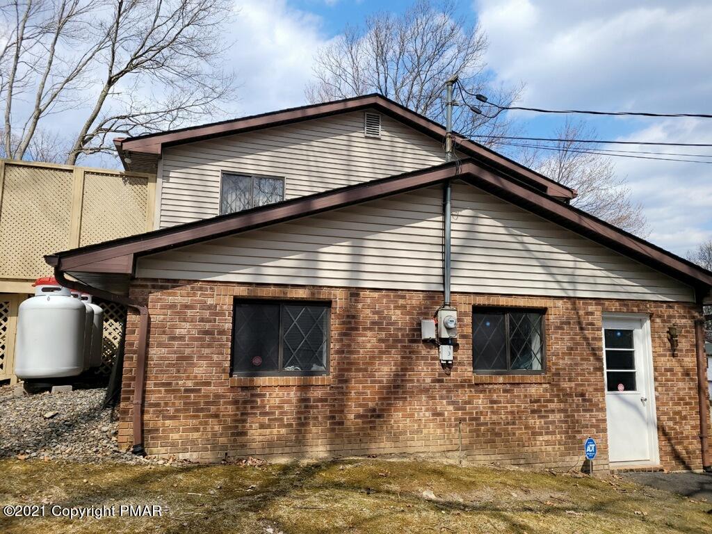 169 Murphy Circle Bushkill, PA 18324 - Photo 6 of 35 a front view of a house with garage