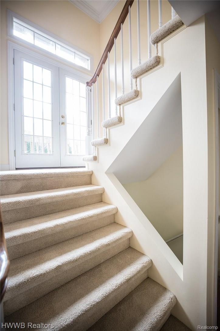 120 Devon Road Bloomfield Hills, MI 48302 - Photo 25 of 45 Architectural details adorn the staircase