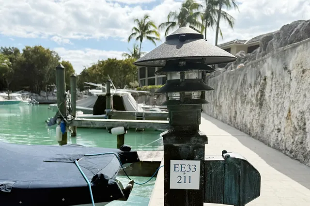 a view of a swimming pool with chairs