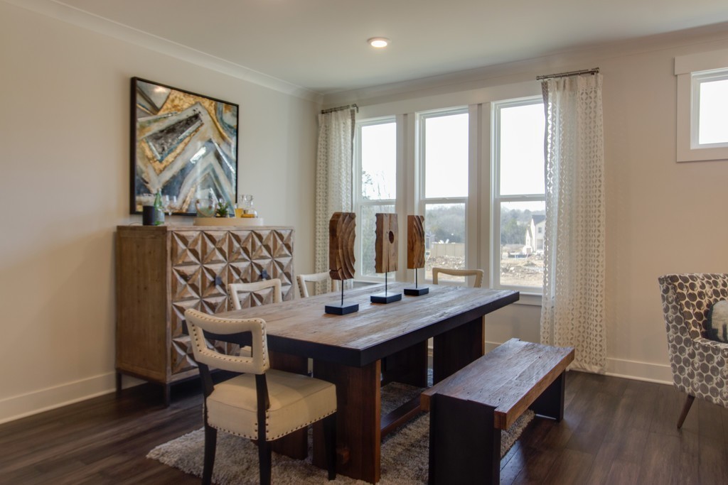 1715 Merkel Road West Columbia, TN 38401 - Photo 12 of 70 a view of a dining room with furniture window and wooden floor