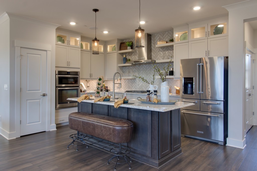 1715 Merkel Road West Columbia, TN 38401 - Photo 15 of 70 a kitchen with kitchen island stainless steel appliances a sink and a refrigerator