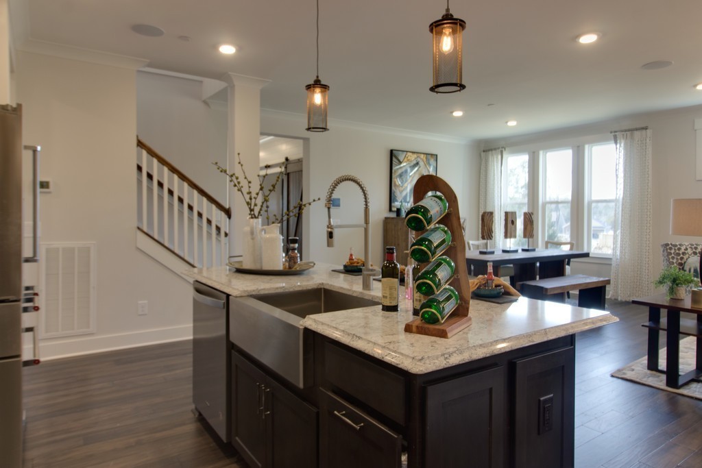 1715 Merkel Road West Columbia, TN 38401 - Photo 16 of 70 a kitchen with a sink a table and chairs