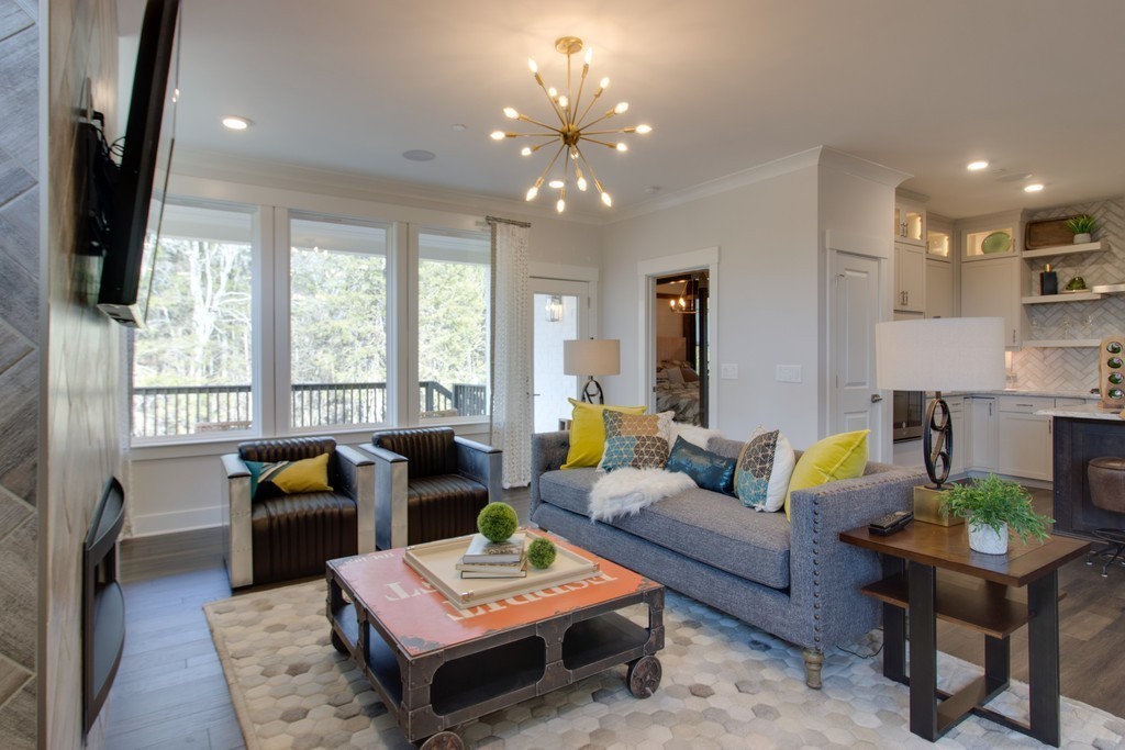 1715 Merkel Road West Columbia, TN 38401 - Photo 20 of 70 a living room with furniture and a chandelier