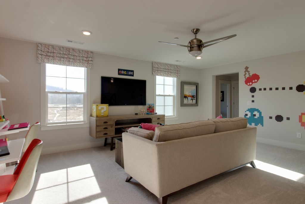 1715 Merkel Road West Columbia, TN 38401 - Photo 28 of 70 a living room with furniture and a flat screen tv