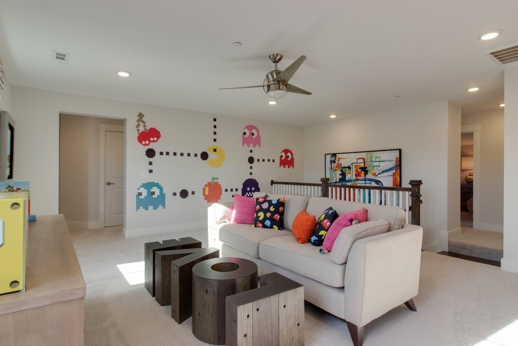 1715 Merkel Road West Columbia, TN 38401 - Photo 29 of 70 a bedroom with furniture a baby crib and a chandelier