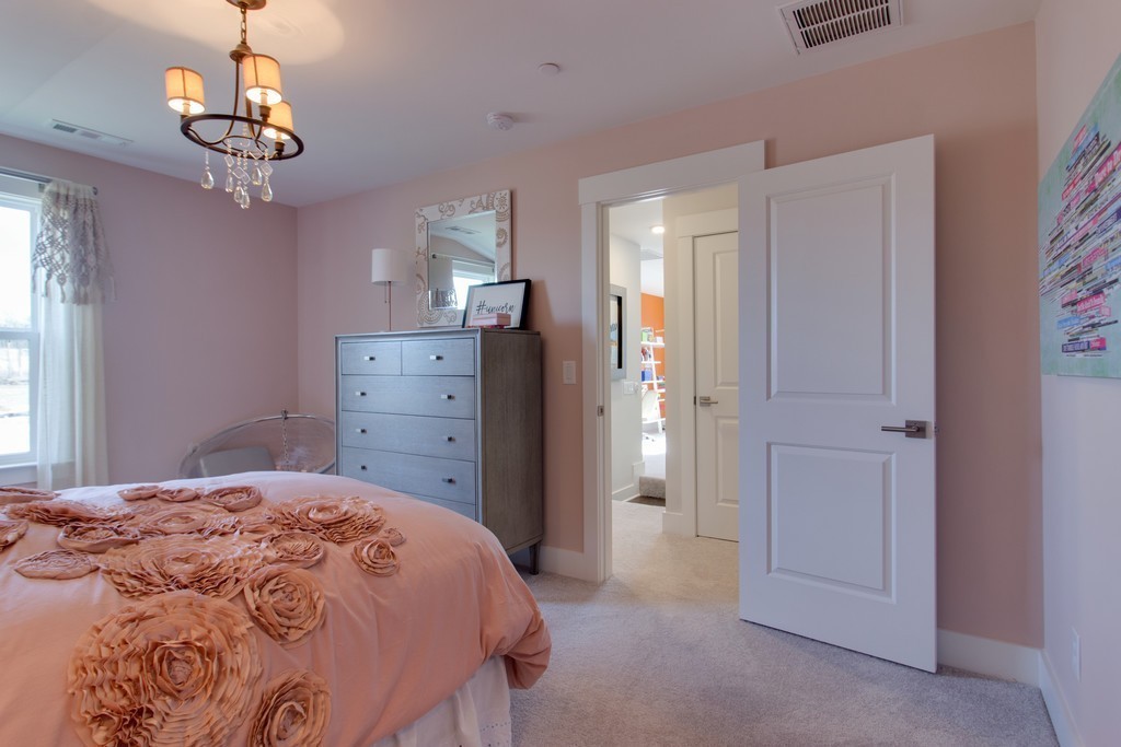 1715 Merkel Road West Columbia, TN 38401 - Photo 33 of 70 a bedroom with a bed and a dresser