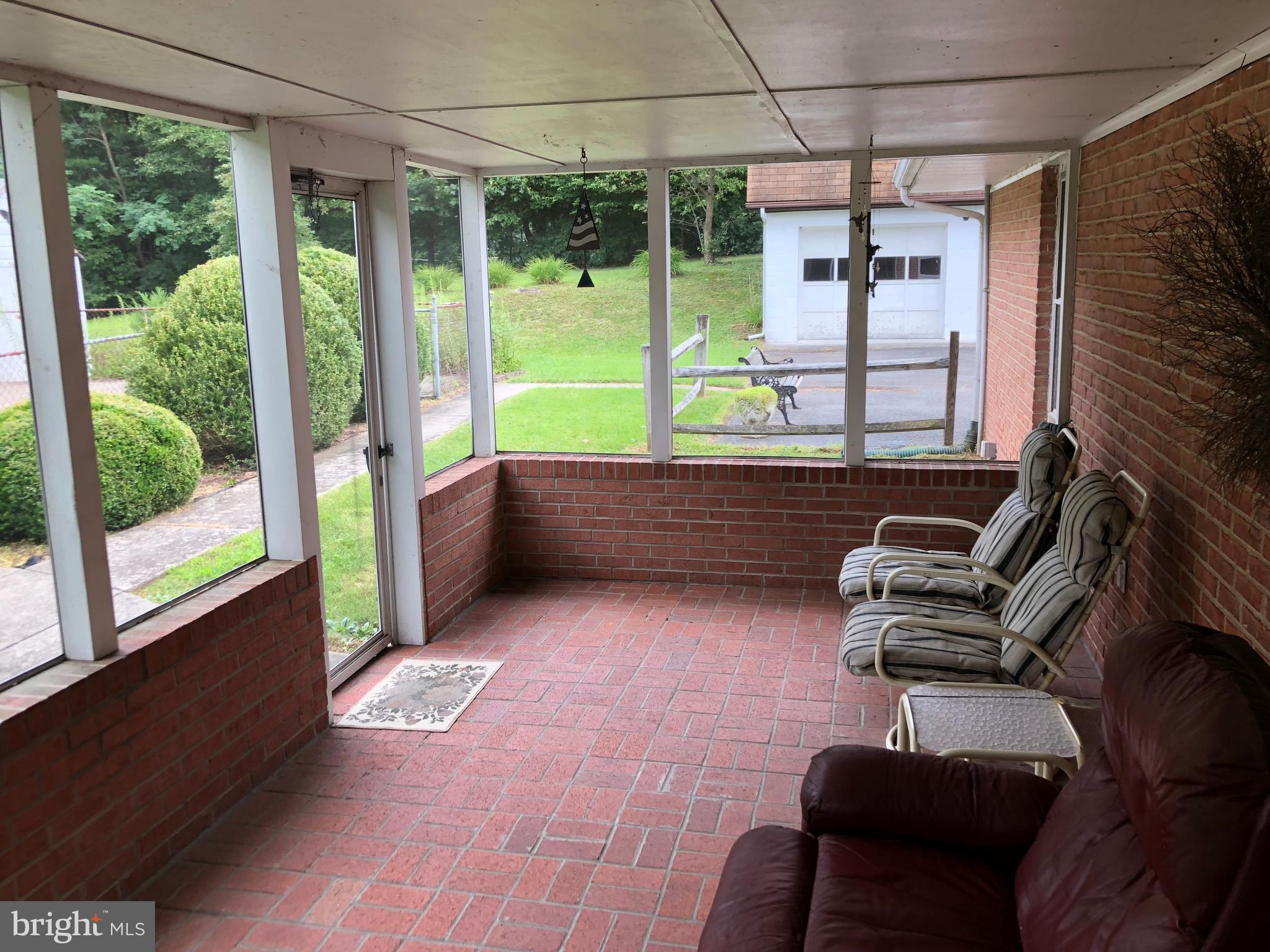 3006 Mann Road Hancock, MD 21750 - Photo 12 of 29 Screened Rear Porch