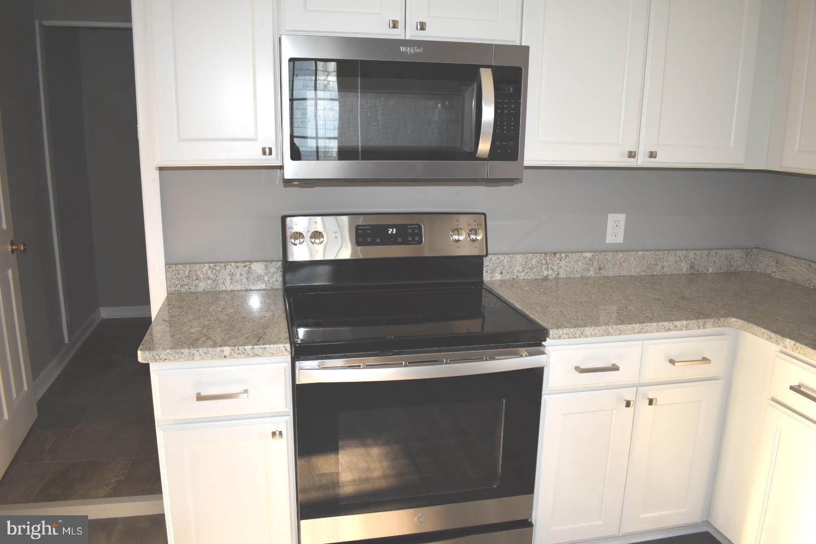21506 Coopertown Road Tilghman, MD 21671 - Photo 12 of 22 Stove and microwave