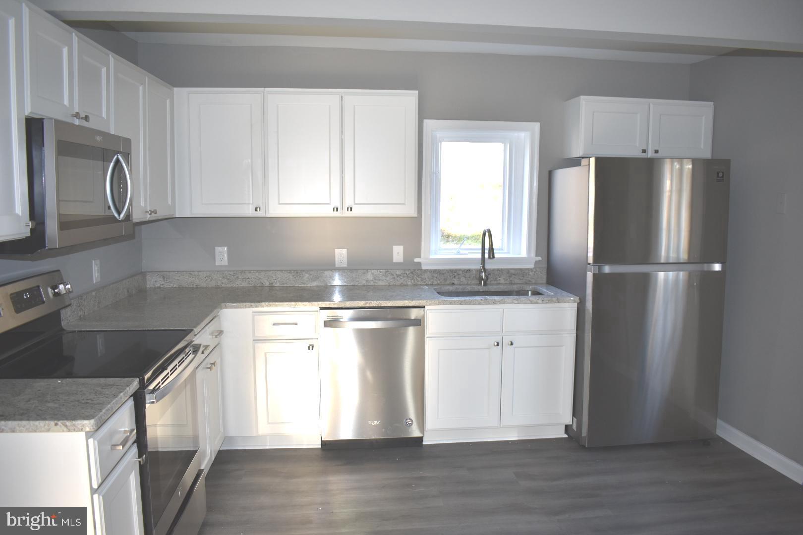 21506 Coopertown Road Tilghman, MD 21671 - Photo 8 of 22 New kitchen