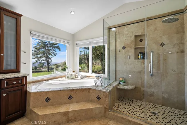 a view of a house with swimming pool and a yard