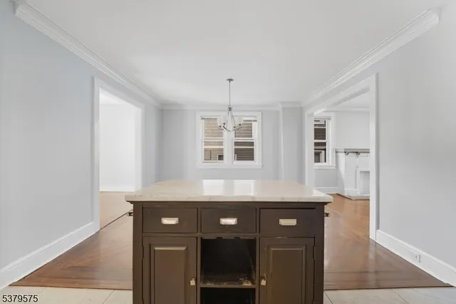 a kitchen with a sink and a window