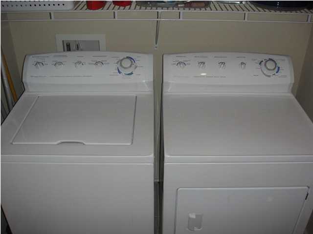 2050 Hwy Santa Rosa Beach, Unit M1414 30A Santa Rosa Beach, FL 32459 - Photo 12 of 14 a close up view of washer and dryer