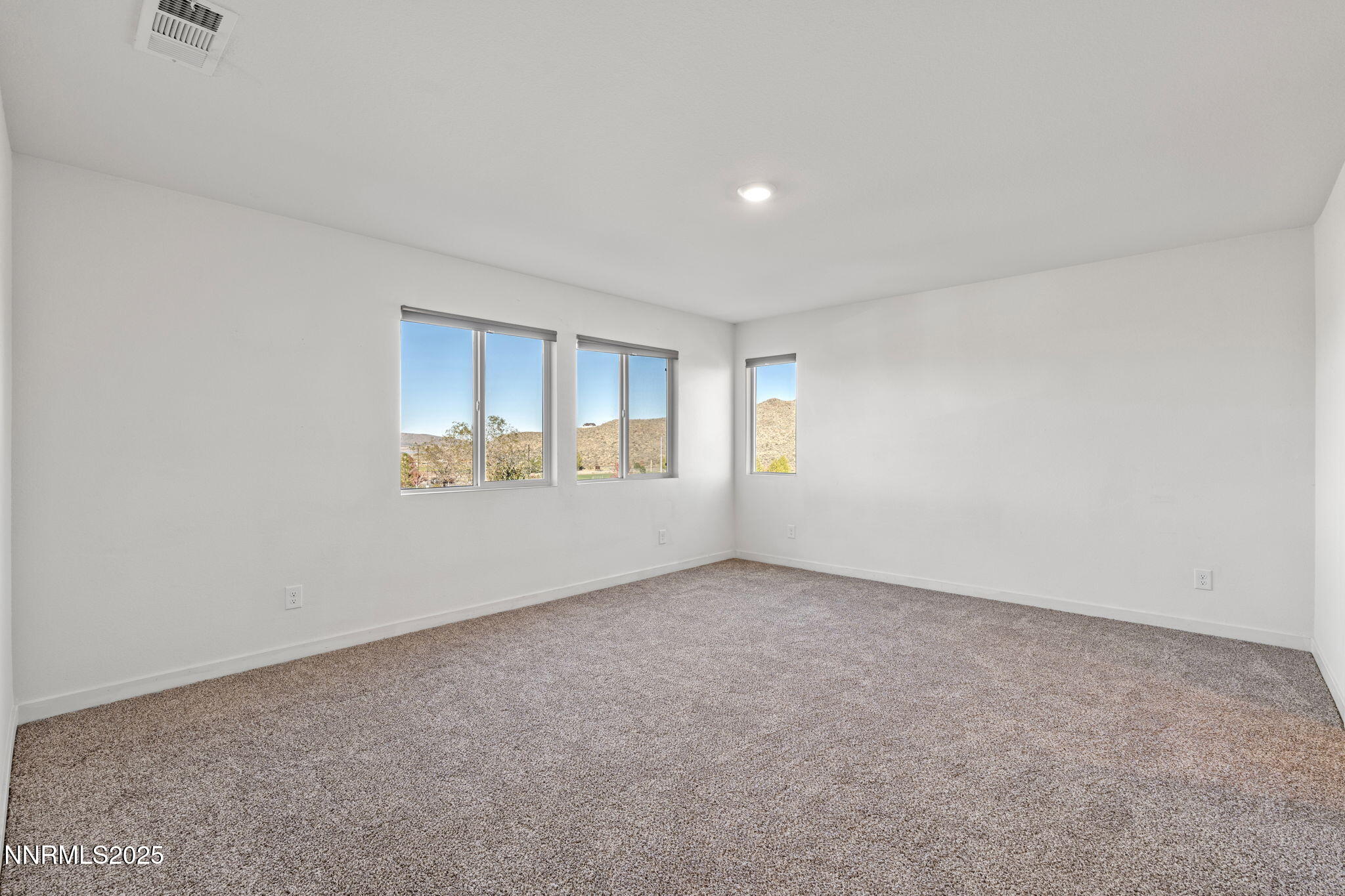 8791 Portia Drive Reno, NV 89506 - Photo 16 of 28 an empty room with a window