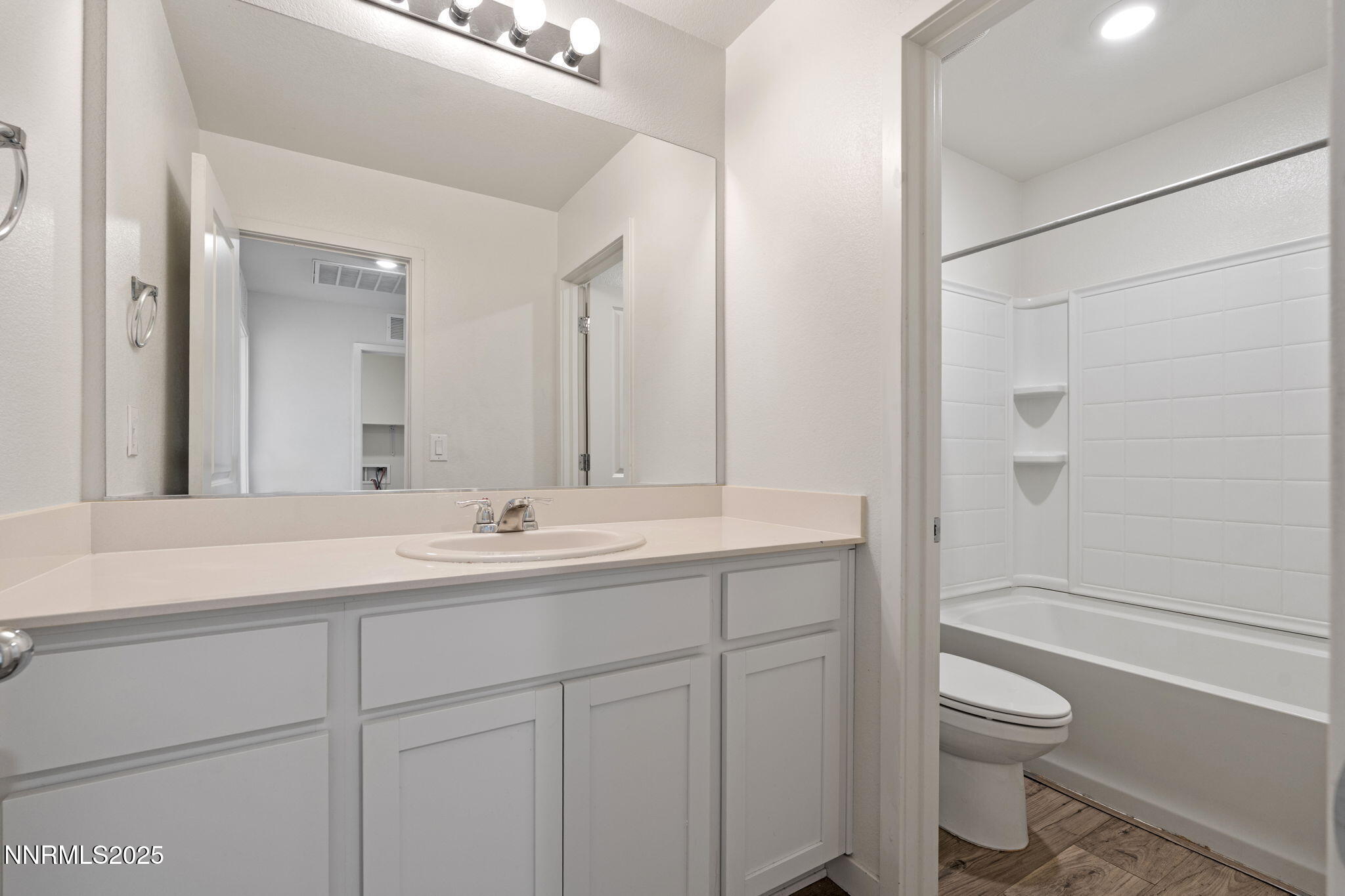 8791 Portia Drive Reno, NV 89506 - Photo 23 of 28 a bathroom with a sink a toilet and shower