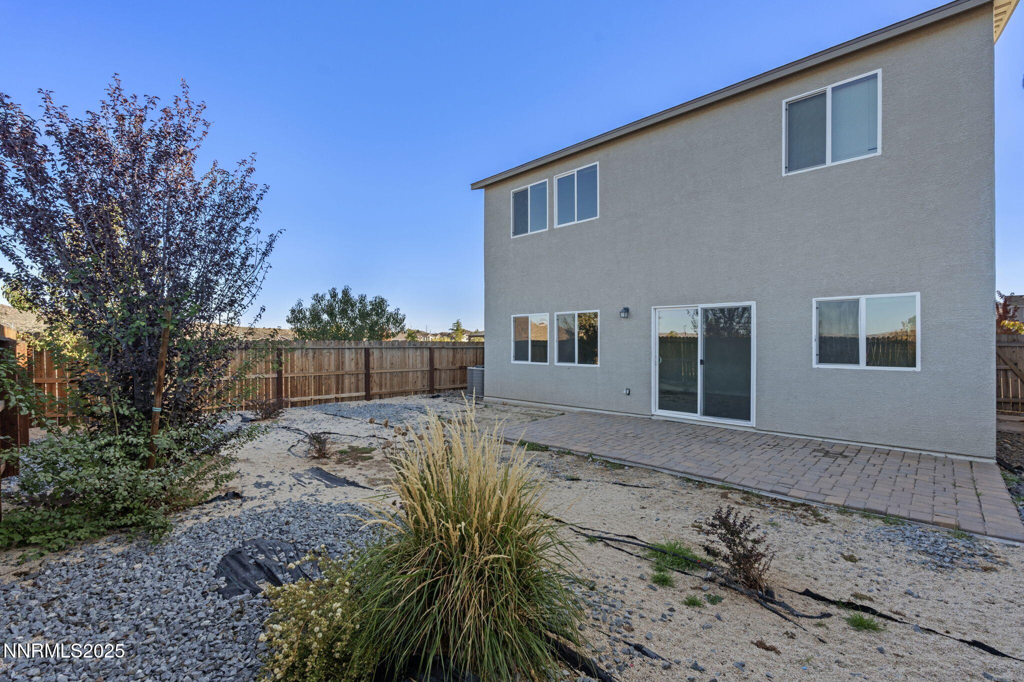 8791 Portia Drive Reno, NV 89506 - Photo 25 of 28 a view of a yard with a house