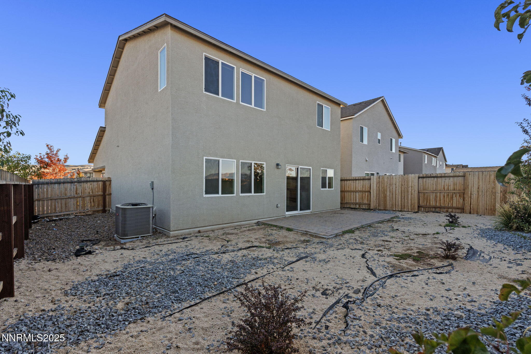 8791 Portia Drive Reno, NV 89506 - Photo 26 of 28 a view of a house with a backyard