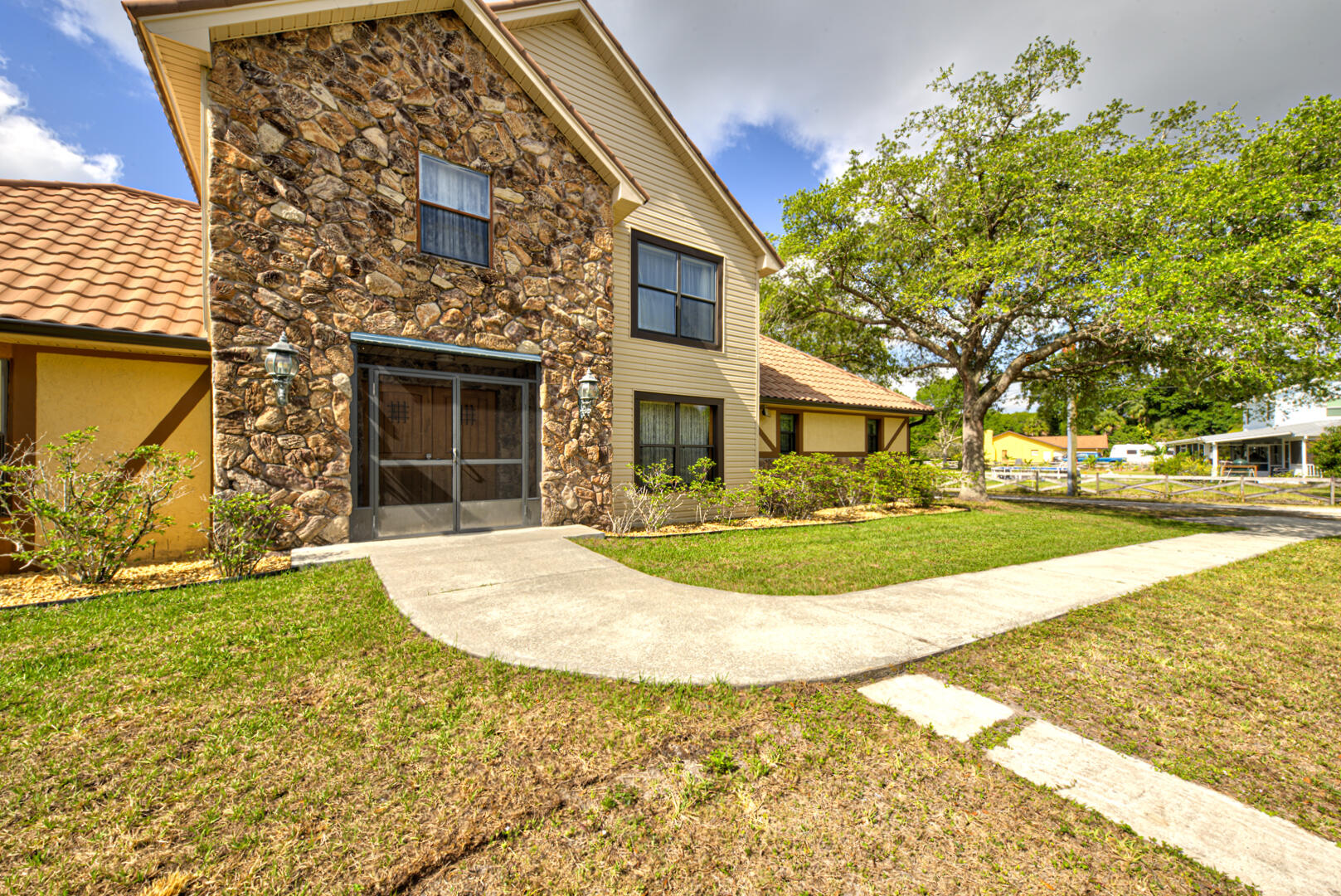 4885 Rayburn Road Cocoa, FL 32926 - Photo 11 of 99 walkway to front porch
