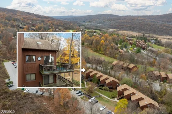 an aerial view of residential house with outdoor space