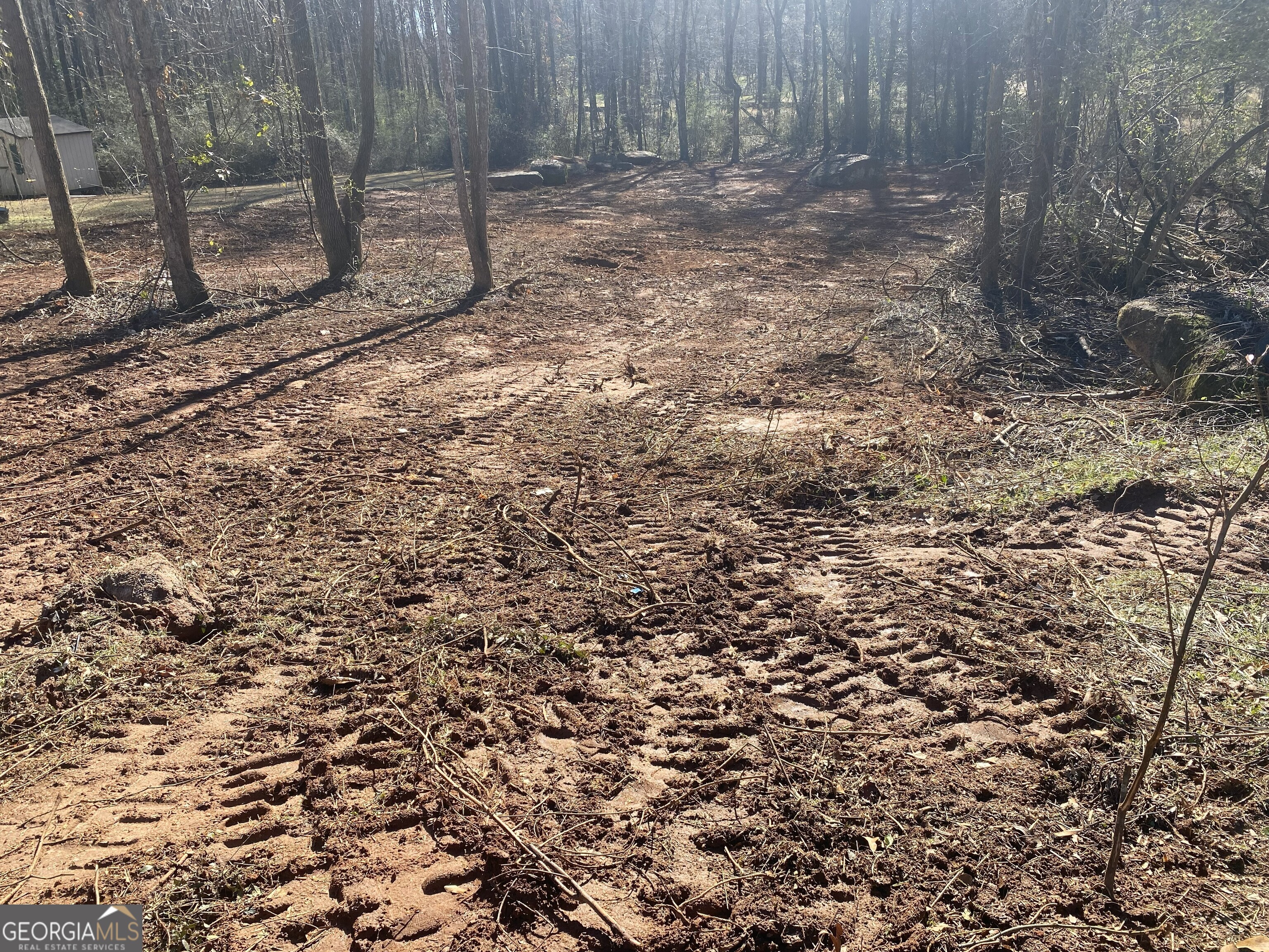 0 Hannah Court, Unit LOT 13 Barnesville, GA 30204 - Photo 3 of 5 a view of a backyard with trees