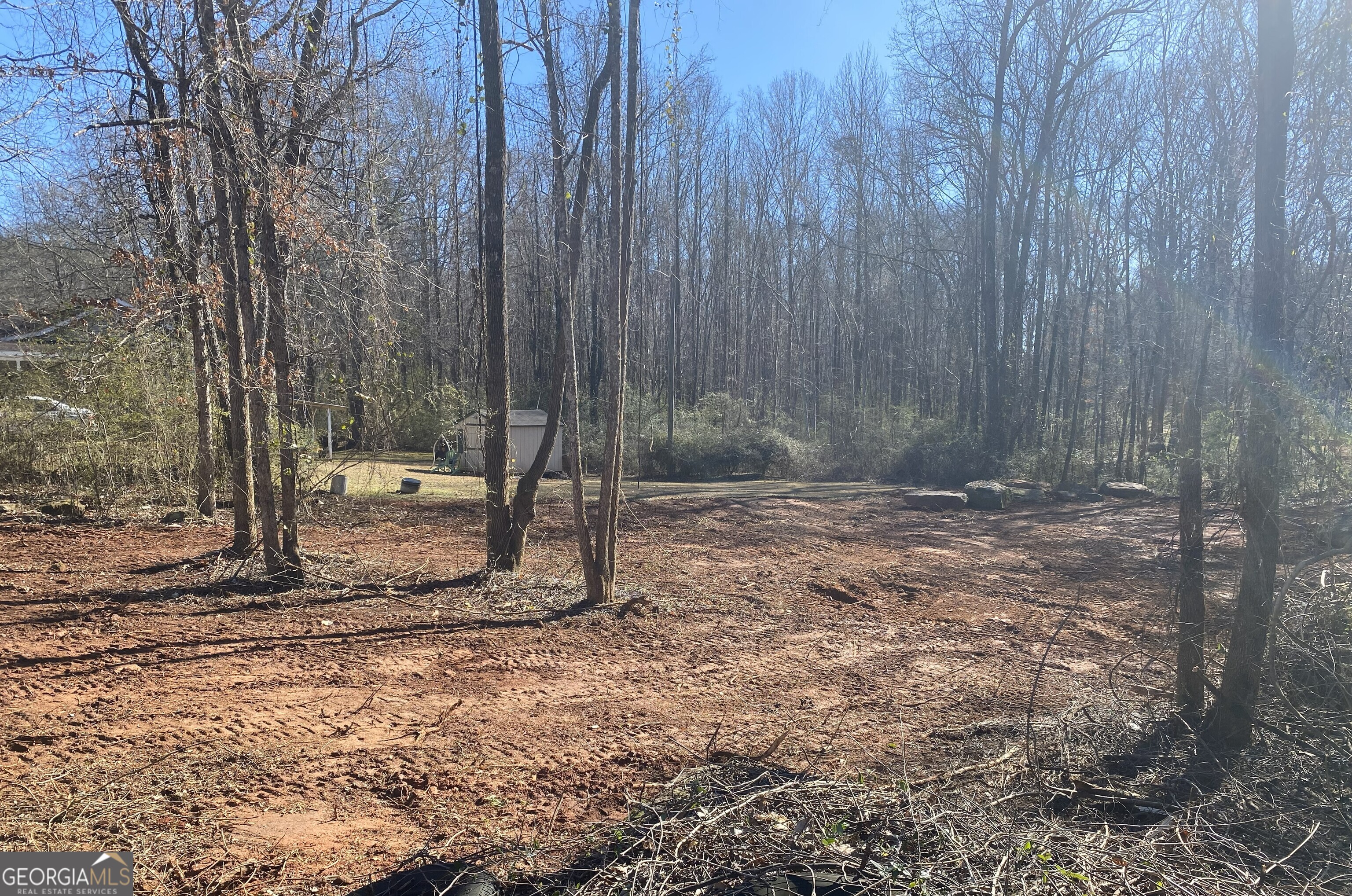 0 Hannah Court, Unit LOT 13 Barnesville, GA 30204 - Photo 4 of 5 a backyard of a house with lots of green space