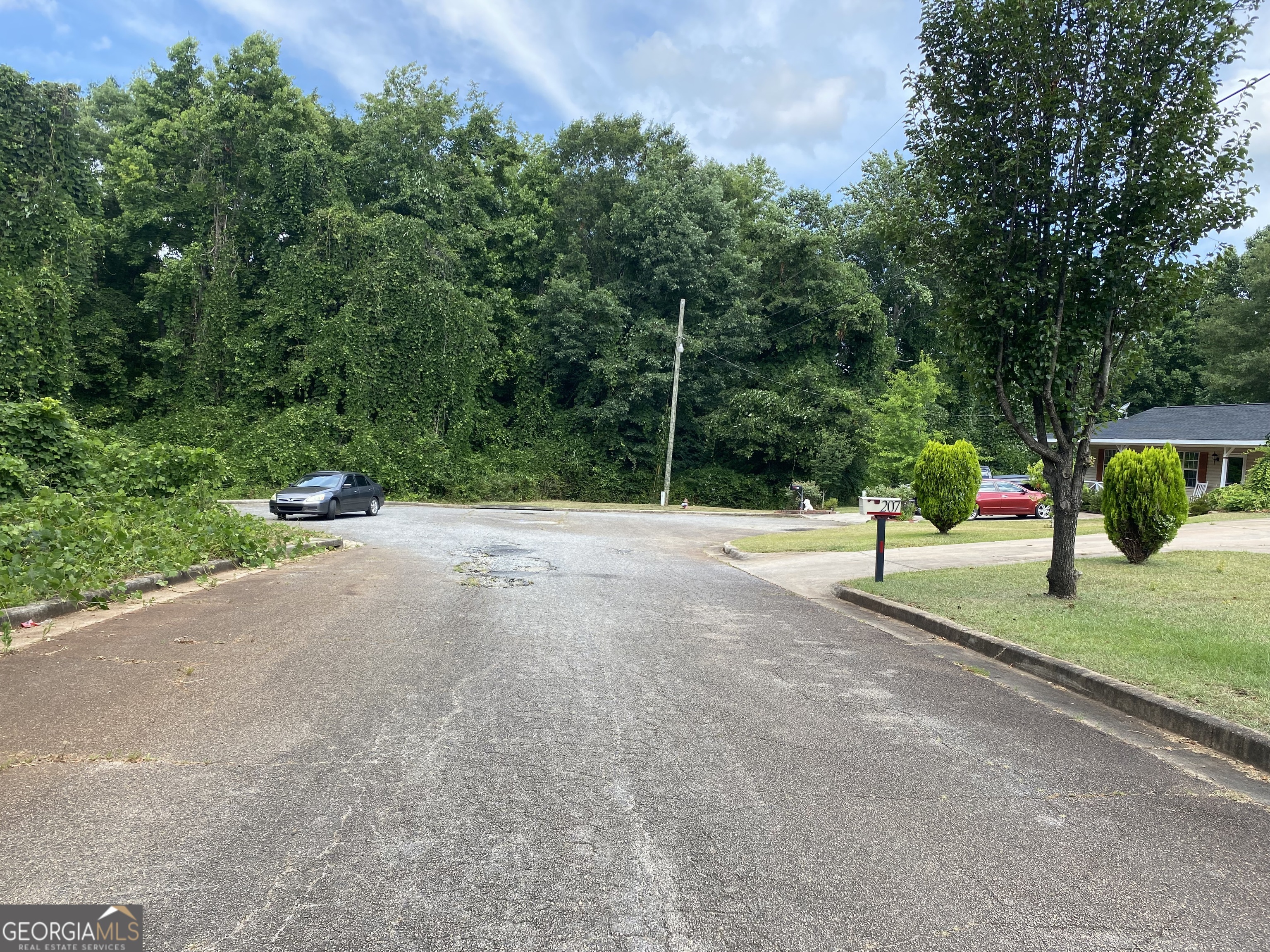 0 Hannah Court, Unit LOT 13 Barnesville, GA 30204 - Photo 5 of 5 a park view with a entertaining space