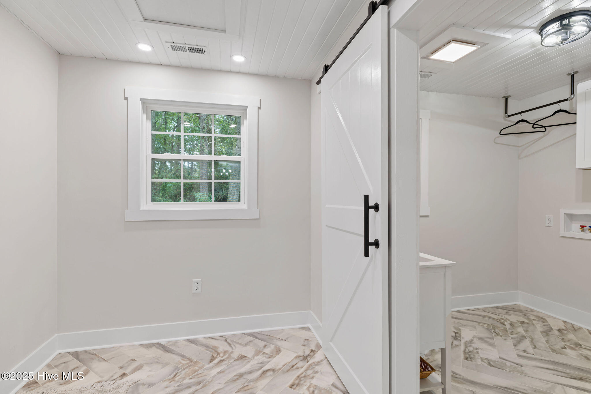 262 Millers Chapel Road Goldsboro, NC 27534 - Photo 54 of 64 View from Kitchen into Mud Room and Laundry 1/2 Bath