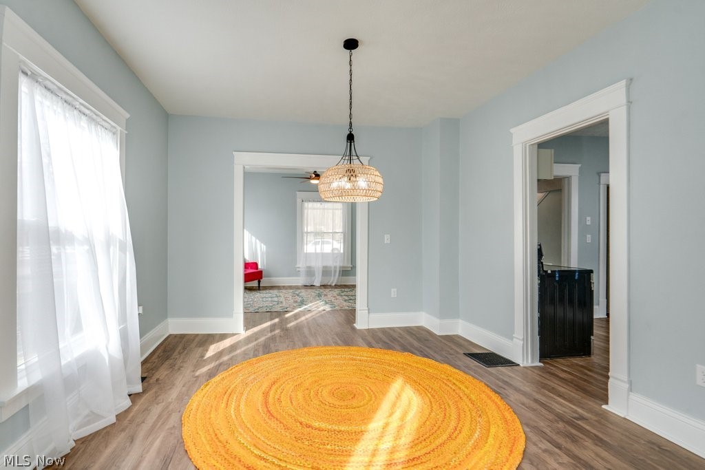 12 South 4th Street Rittman, OH 44270 - Photo 20 of 48 Dining area featuring wood finished floors and ceiling fan
