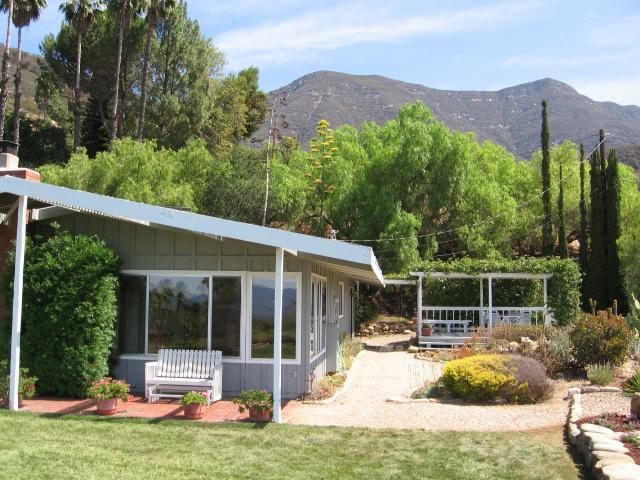 1634 Foothill Road Ojai, CA 93023 - Photo 6 of 7 a view of a house with backyard and sitting area