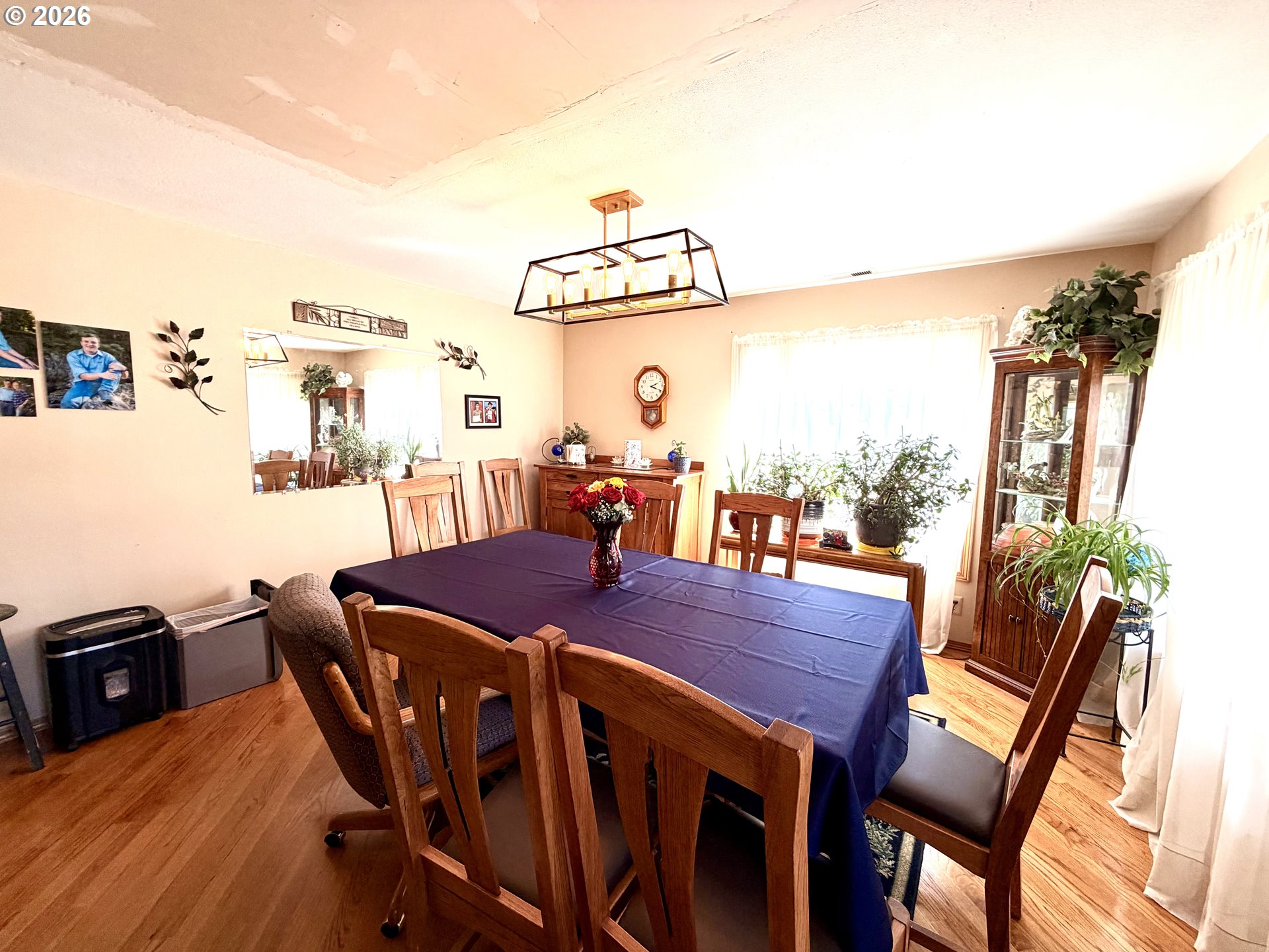 1401 Northeast 267th Avenue Camas, WA 98607 - Photo 7 of 16 a view of a dining room with furniture and a chandelier