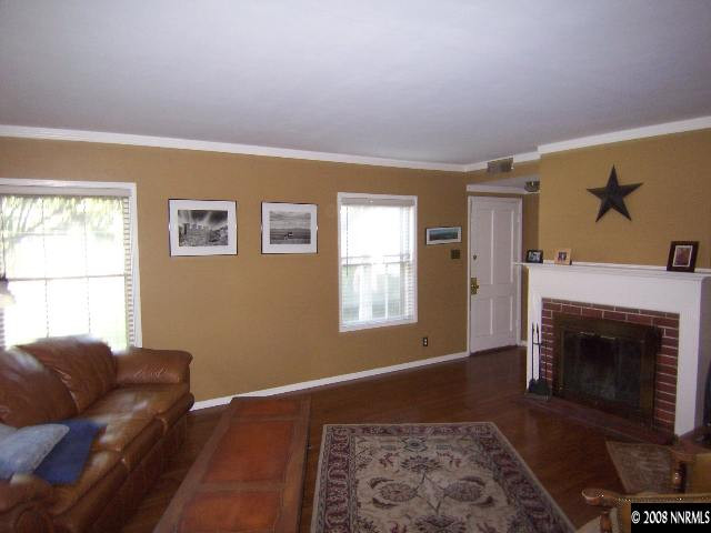 915 Primrose Street Reno, NV 89509 - Photo 5 of 9 a living room with furniture and a fireplace