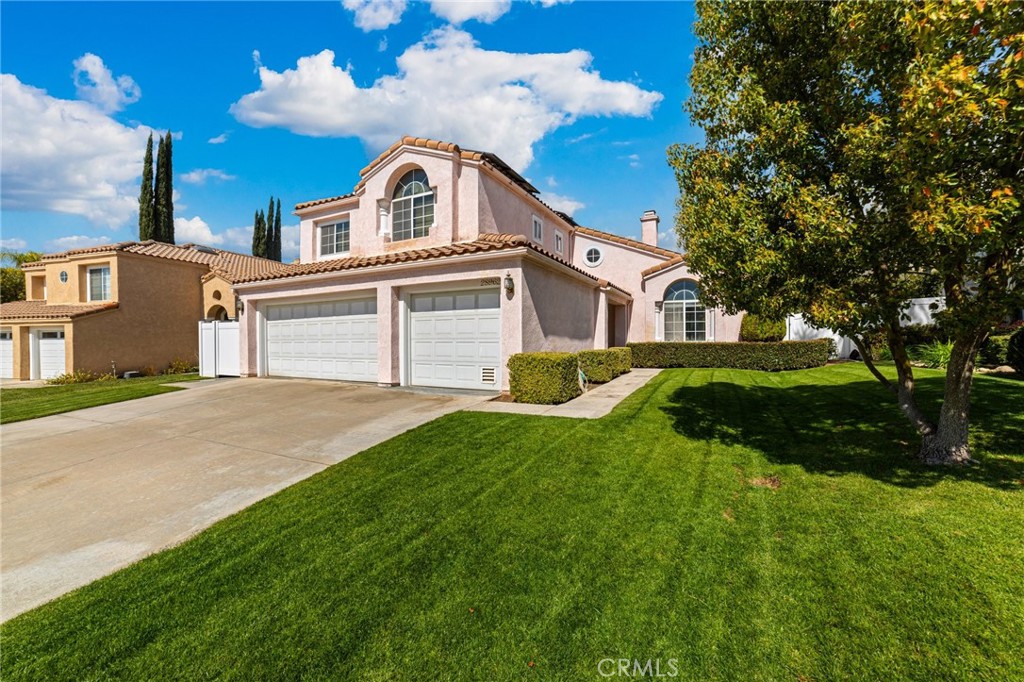 28962 Clear Spring Lane Highland, CA 92346 - Photo 2 of 32 a front view of a house with a yard