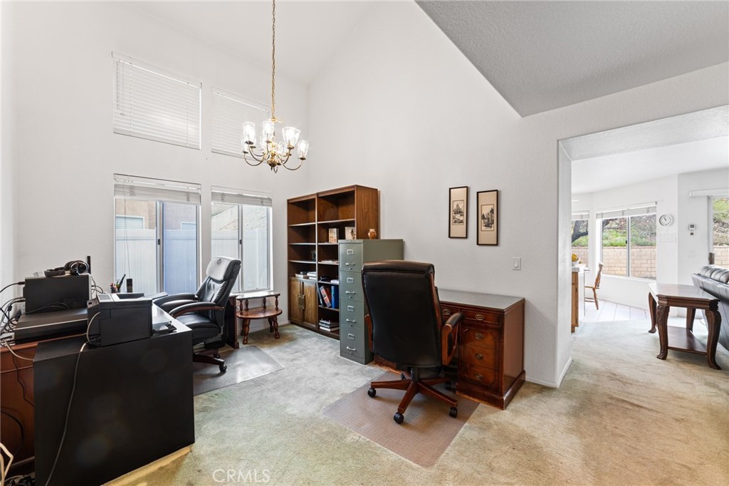 28962 Clear Spring Lane Highland, CA 92346 - Photo 27 of 32 a view of a workspace with furniture and a window