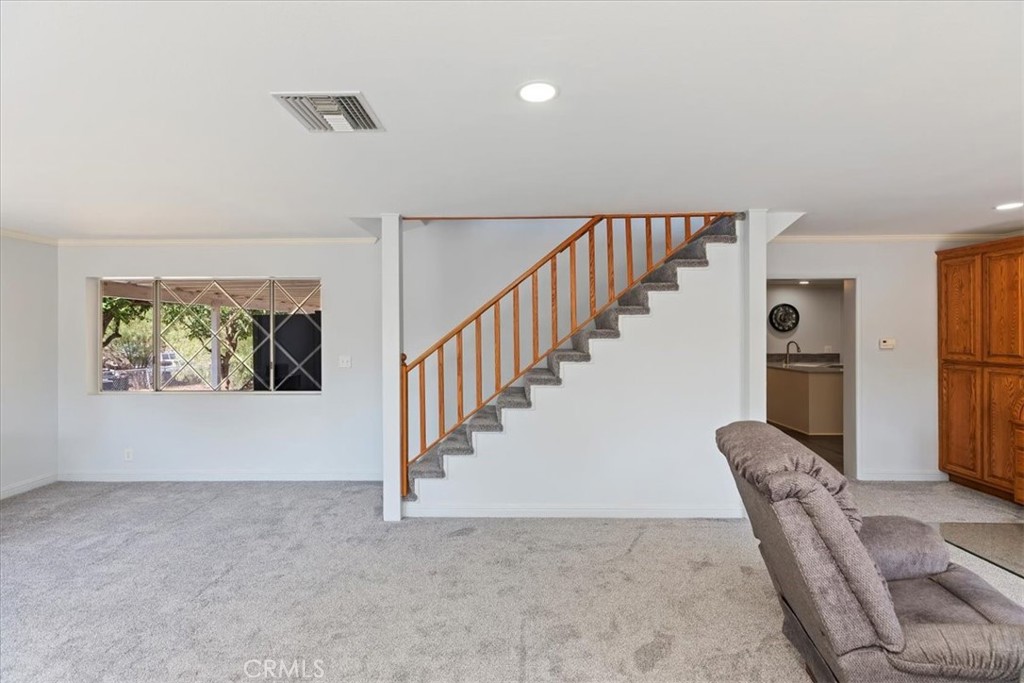 10555 Robinson Avenue Riverside, CA 92505 - Photo 17 of 65 a view interior of a house with wooden floor and stairs