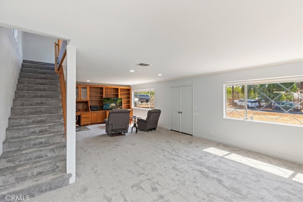 10555 Robinson Avenue Riverside, CA 92505 - Photo 21 of 65 a view of a livingroom with furniture and windows