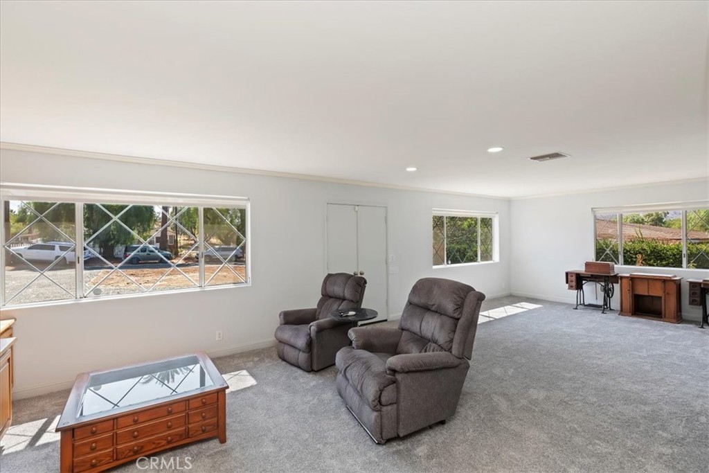 10555 Robinson Avenue Riverside, CA 92505 - Photo 23 of 65 a living room with furniture and a window