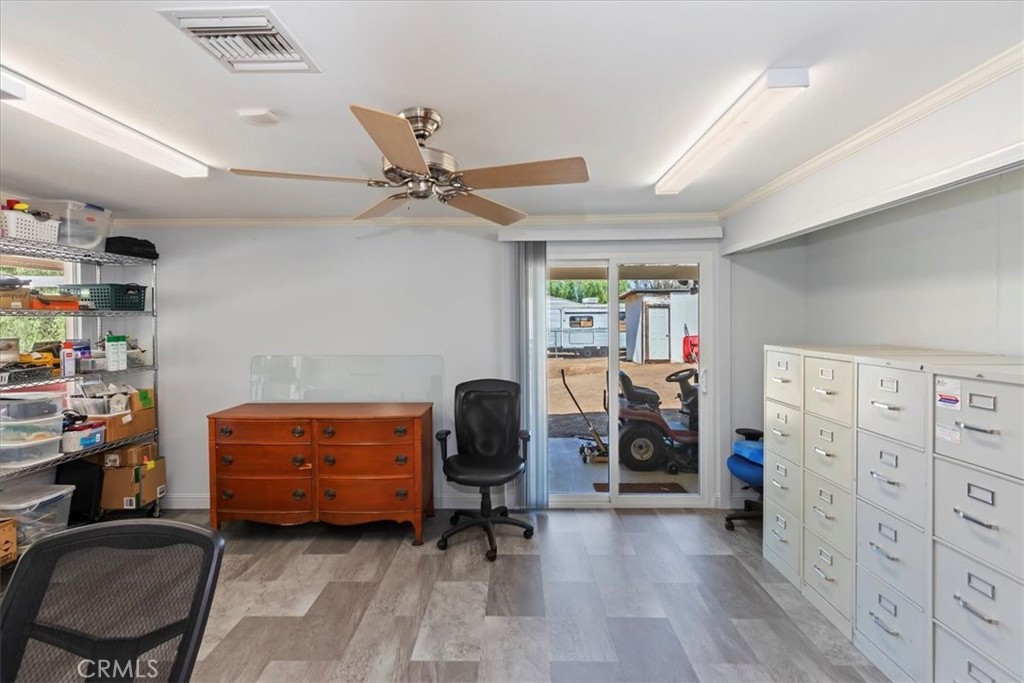 10555 Robinson Avenue Riverside, CA 92505 - Photo 31 of 65 a room with furniture and a chair