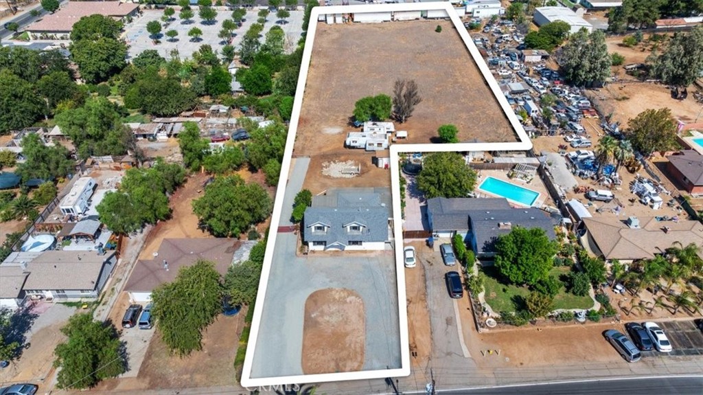 10555 Robinson Avenue Riverside, CA 92505 - Photo 4 of 65 an aerial view of multiple houses with outdoor space