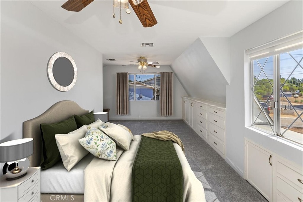 10555 Robinson Avenue Riverside, CA 92505 - Photo 41 of 65 a bedroom with bed and window