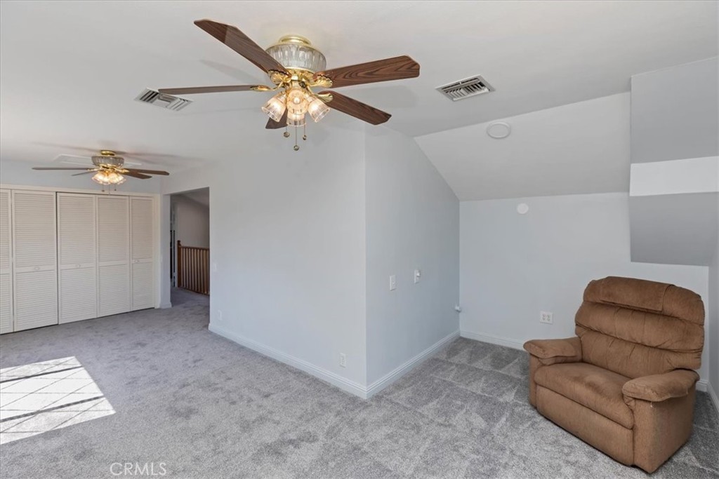 10555 Robinson Avenue Riverside, CA 92505 - Photo 43 of 65 a living room with furniture and a ceiling fan