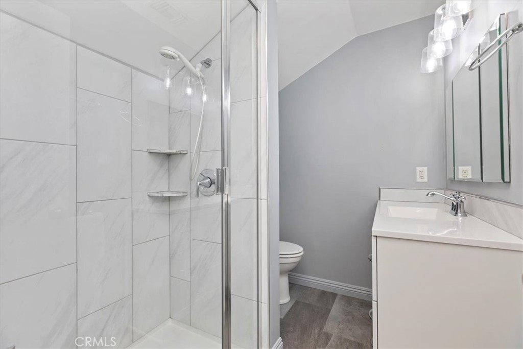 10555 Robinson Avenue Riverside, CA 92505 - Photo 44 of 65 a bathroom with a sink toilet and shower