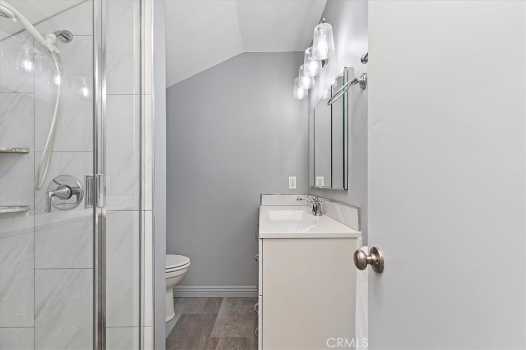 10555 Robinson Avenue Riverside, CA 92505 - Photo 45 of 65 a bathroom with a sink a toilet and shower